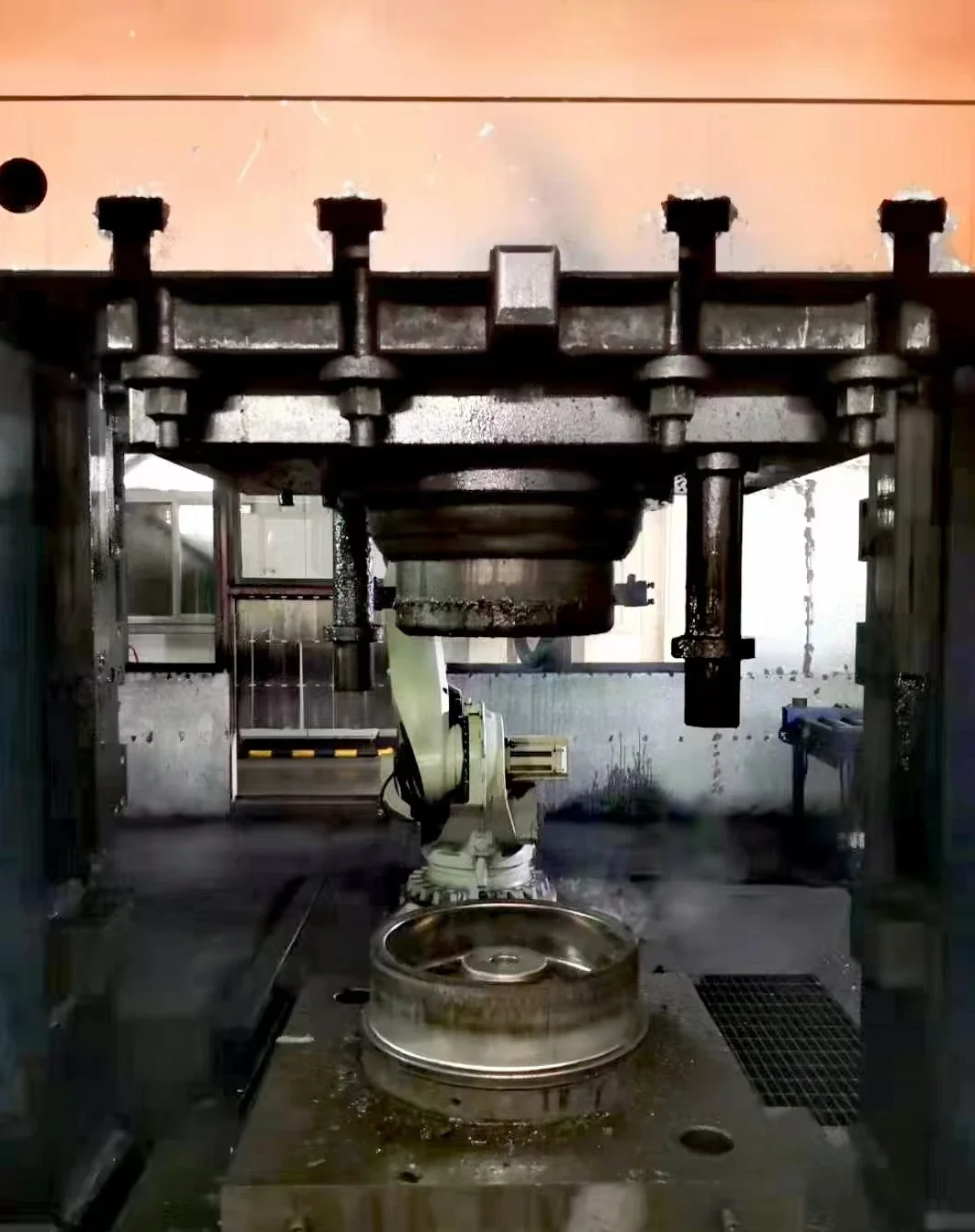 High-pressure forging of an aluminum wheel blank